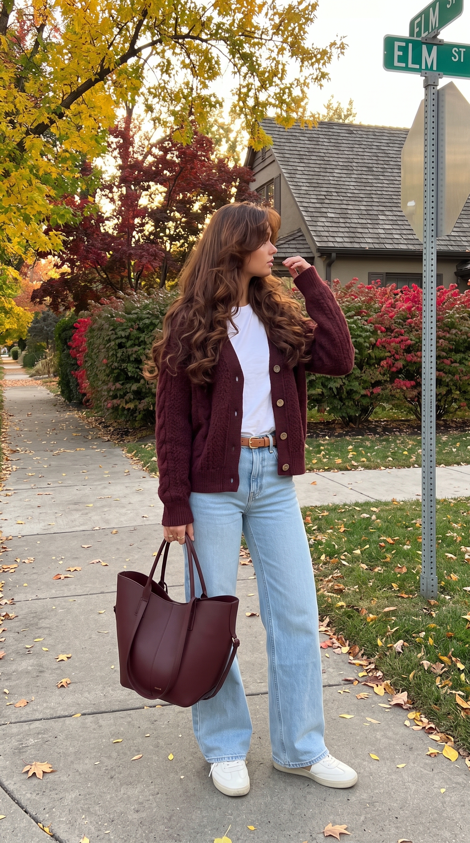 Green ribbed cardigan with wide leg jeans and white sneakers casual Christmas outfit