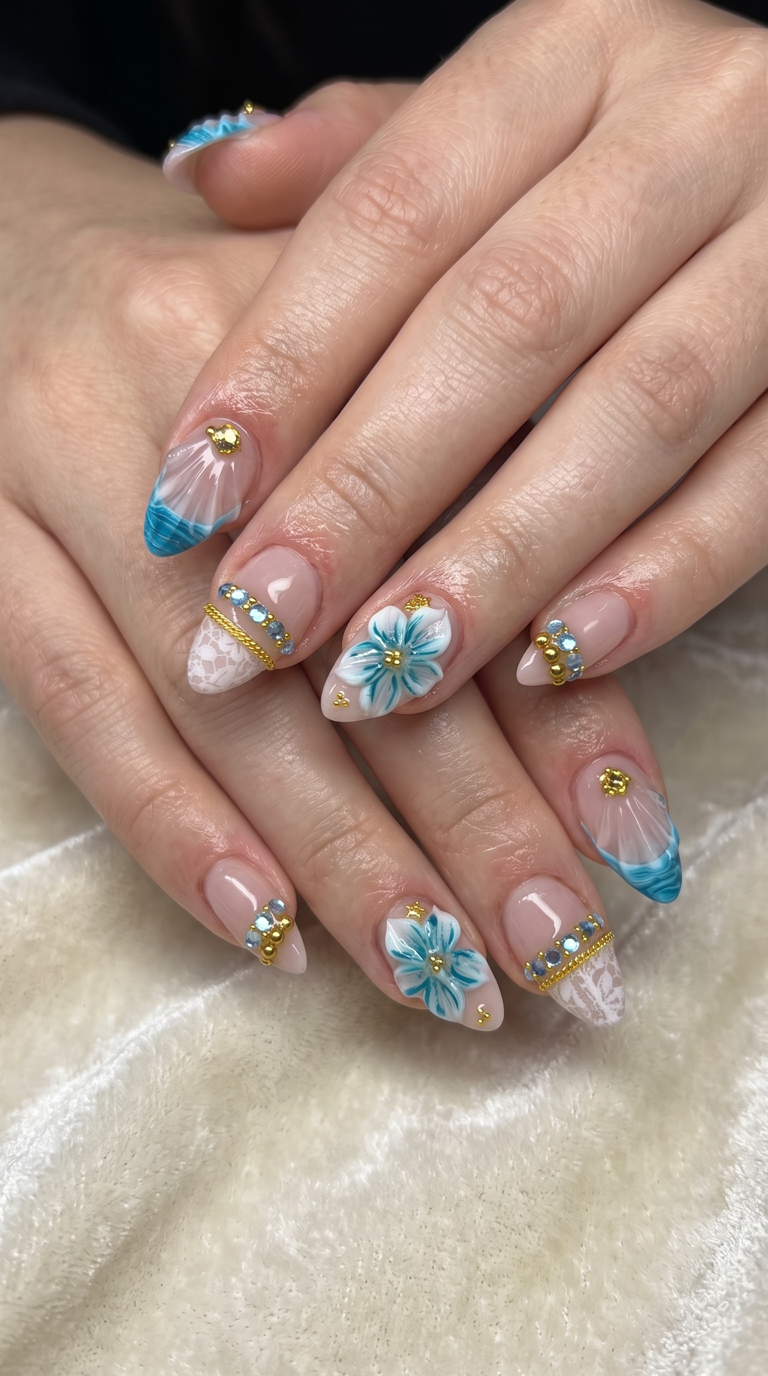 Blue ocean floral 3D nail art with gold charms lace and seashell details summer