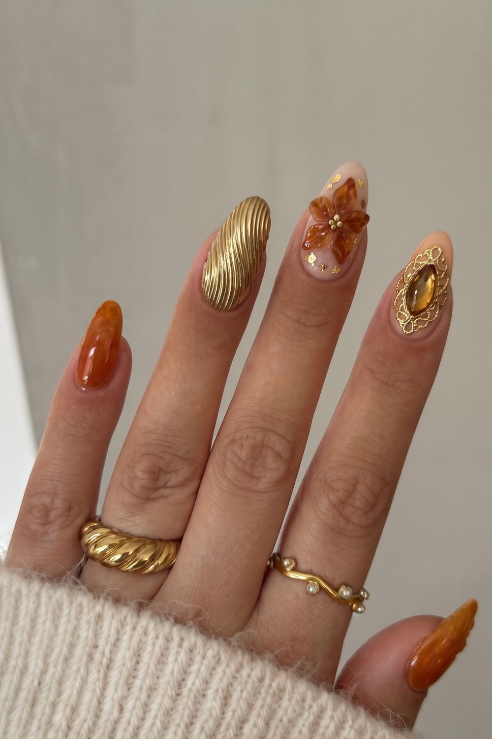 Pearl cream and gold jewelry-inspired fall acrylic nails