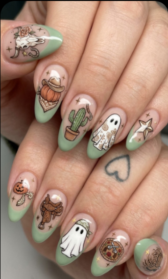 Green glitter nails with glossy black tips, small ghosts and rhinestones