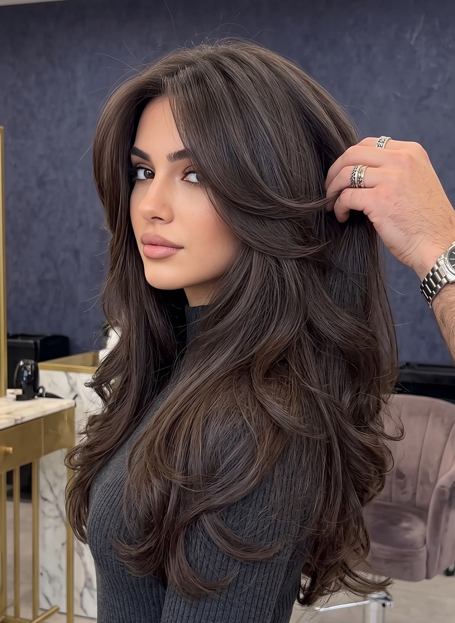 Long brunette wolf cut with 90s blowout volume and swooping layers