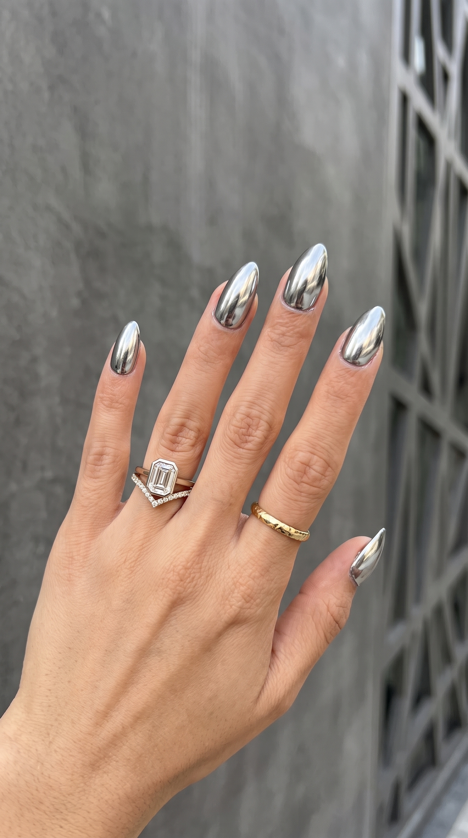 Silver chrome mirror nails with diamond engagement ring and gold band summer nails